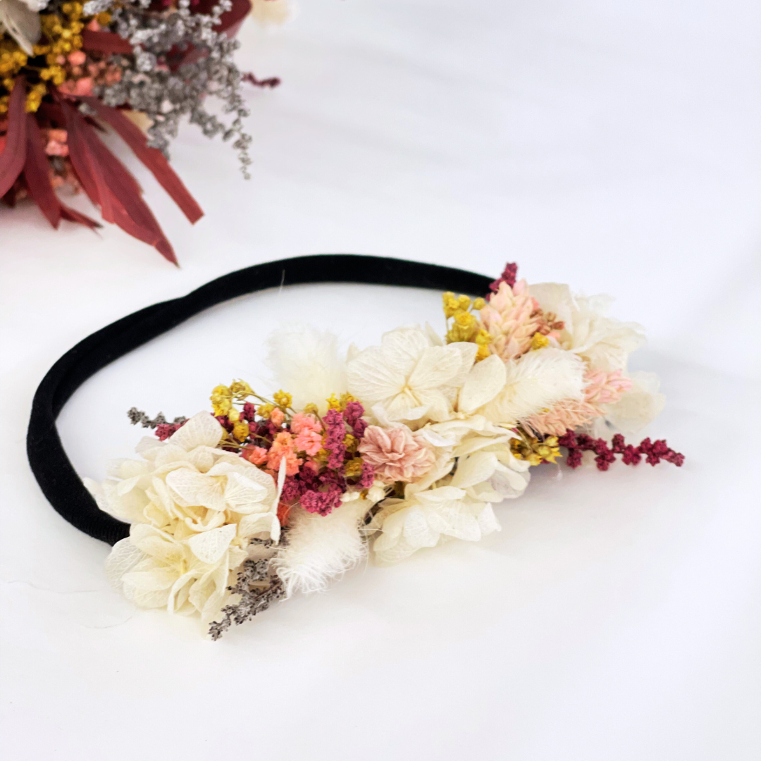 elástico con flores para bebé