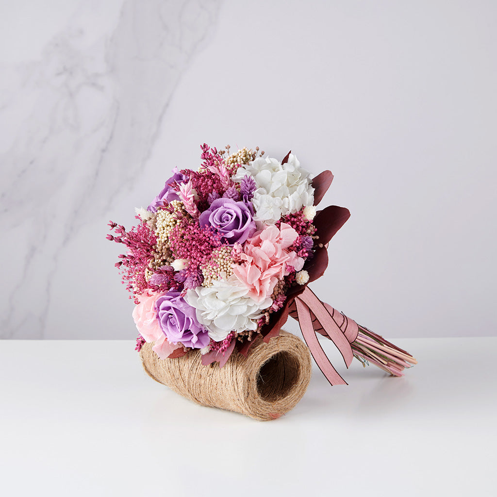 ramo de novia preservado en tonos rosas y lilas