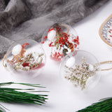 bolas transparentes con flores de Navidad