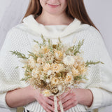 ramo de flores blancas preservadas con margaritas y avena