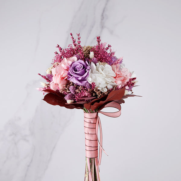ramo de novia preservado en tonos lilas y rosas