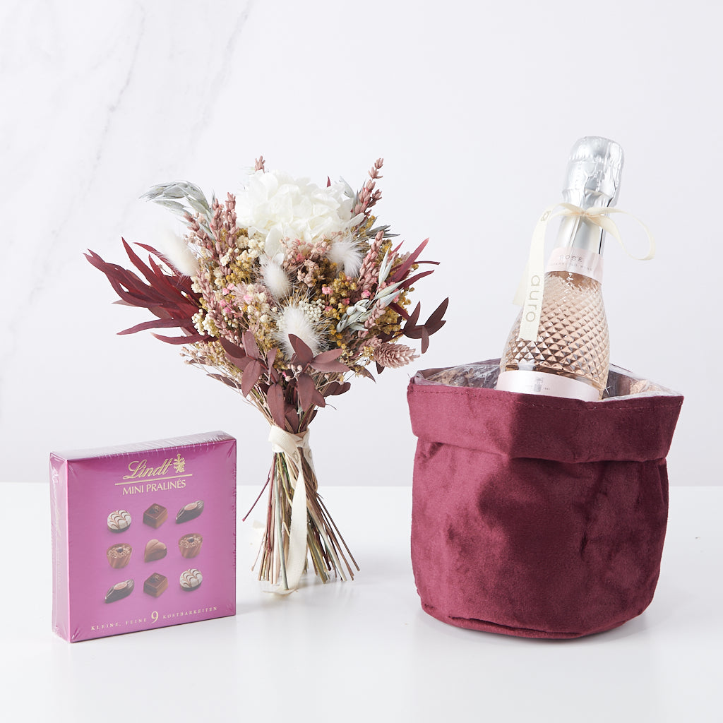 pack regalo de ramito de flores, chocolates y minicava